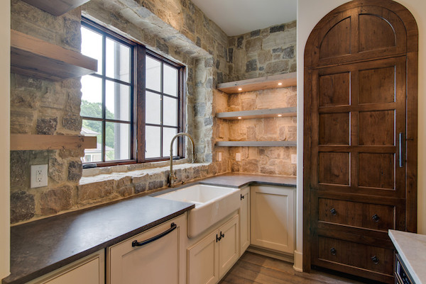 Stone-Wall-Opening-Shelving-Contemporary-Tuscan-Home-Carbine-And-Associates-Franklin-TN