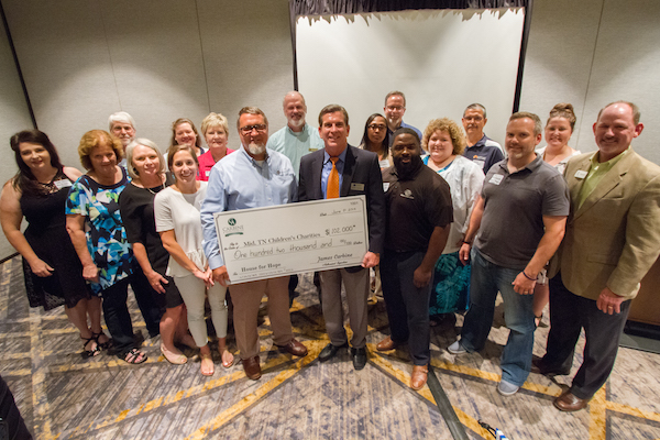 Carbine-And-Associates-Donates-$102,000-To-Charity