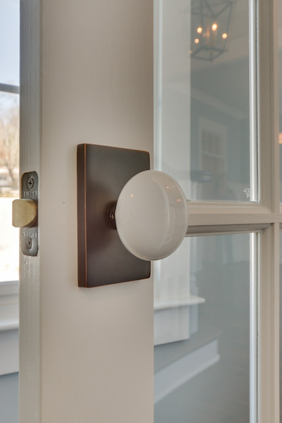 white-porcelain-knob-Federal-style-new-home-Carbine-And-Associates